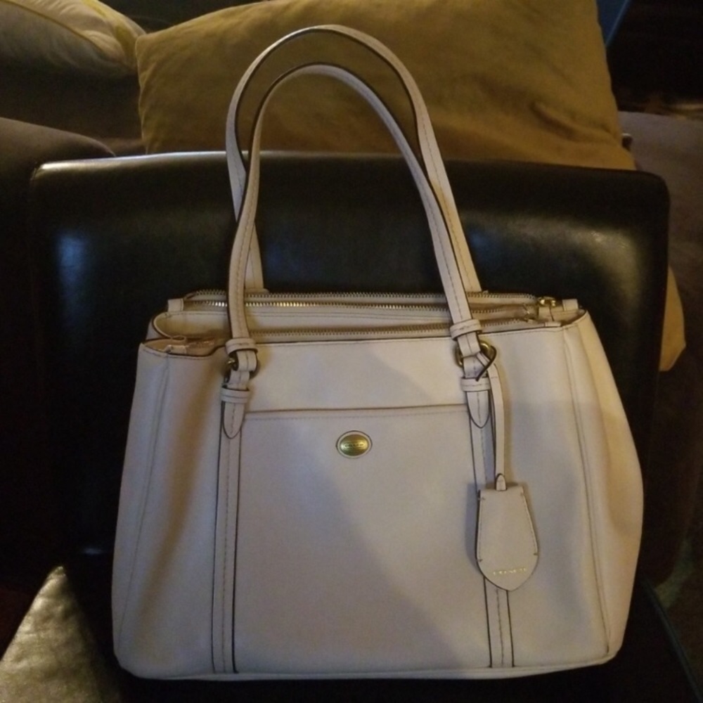 Cream and gold coach purse